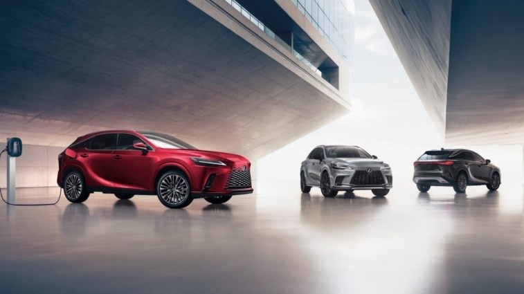 The 2024 Lexus RX 450h+ hybrid parked with other RX models