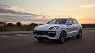 The 2024 Porsche Cayenne Turbo E-Hybrid seen from a front quarter angle