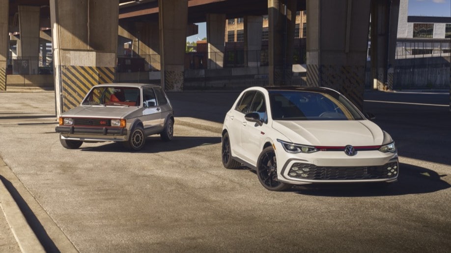 The 2024 Volkswagen GTI 380 pictured with the original Golf GTI