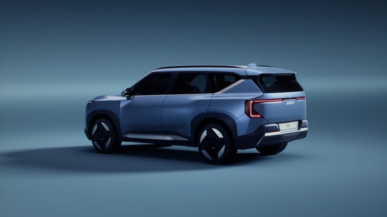 The 2025 Kia EV5 seen from a rear quarter angle