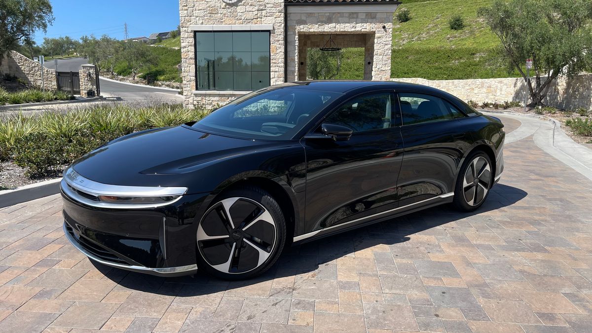 2023 Lucid Air Pure in black near stone building.