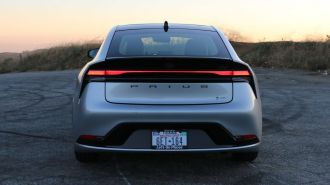 2023 Toyota Prius Limited in silver rear view.