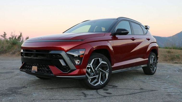 2024 Hyundai Kona N Line in red front angle at sunrise.