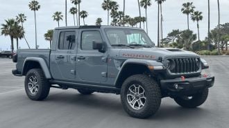 Front view of the 2024 Jeep Gladiator Mojave X in Anvil gray