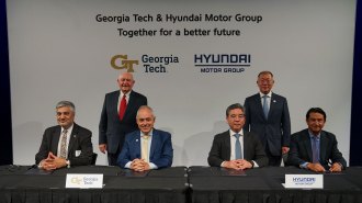 Hyundai executives at Georgia Tech signing agreement.
