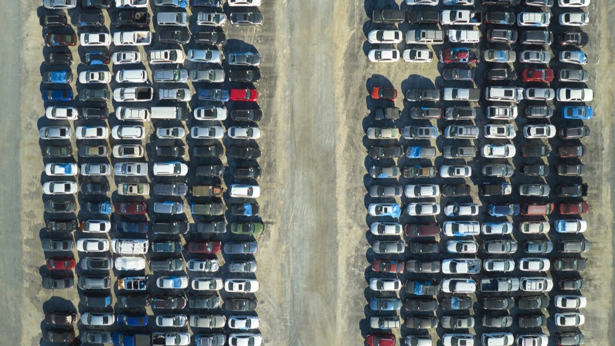a parking lot full of cars awaiting auction