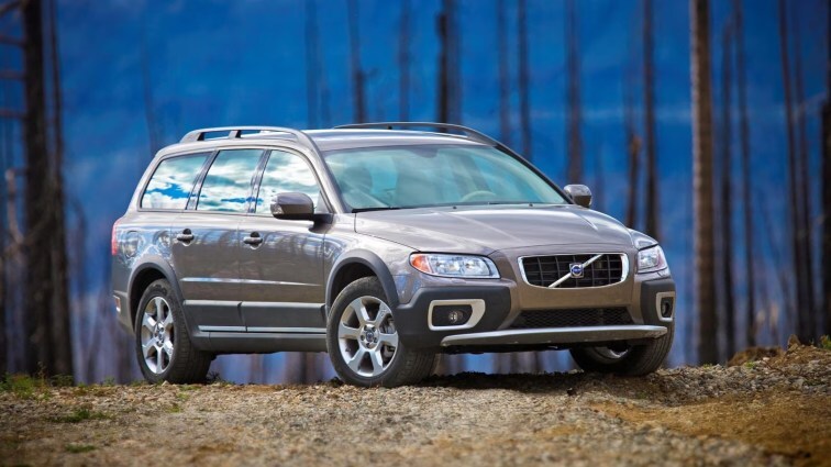 2011 Volvo XC70 in a forest.