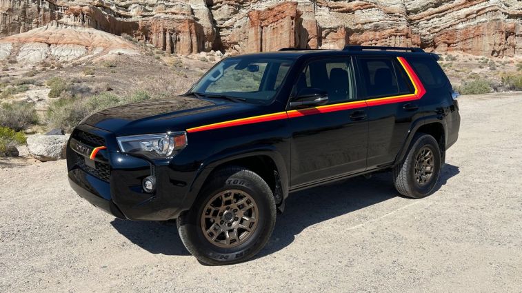 2023 Toyota 4Runner 40th Anniversary Edition in black with rock formations in the background.