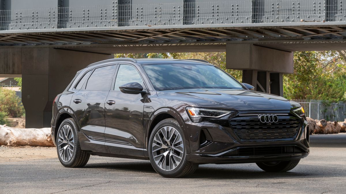 2024 Audi Q8 e-tron near a bridge.