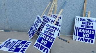 Discarded picket signs from the current auto worker strike