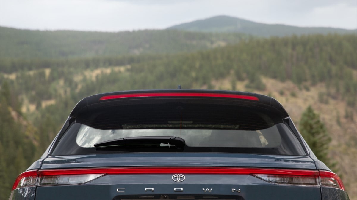 A teaser photo showing the rear of the Toyota Crown SUV from the beltline up