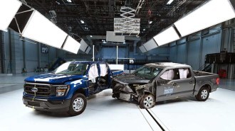 Two full-size trucks after IIHS crash testing