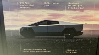 A Cybertruck advertising placard in a Tesla store