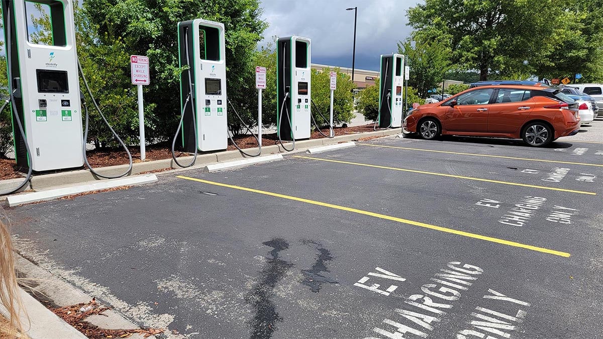 The Nissan Leaf charges at a charging center.