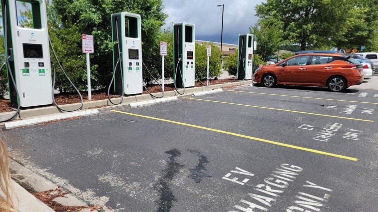 The Nissan Leaf charges at a charging center.