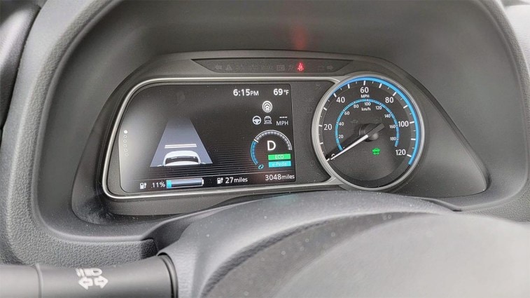 The Nissan Leaf's range estimate reads 27 miles.