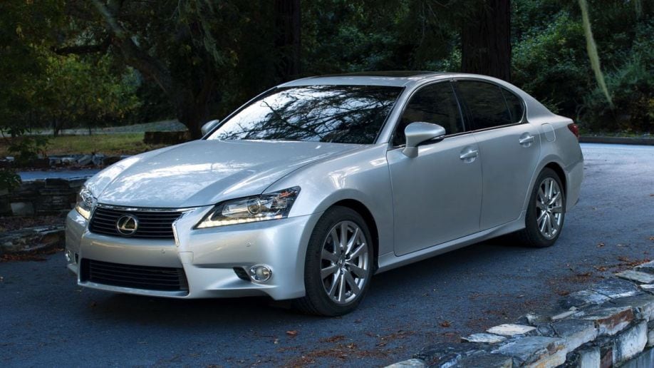 2015 Lexus GS 350 in silver near trees.