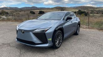 2023 Lexus RZ450e with hills in the background.