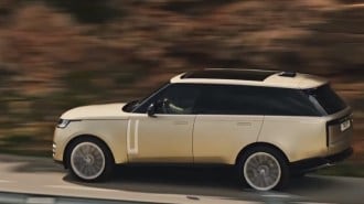A teaser photo showing the first electric Range Rover in profile