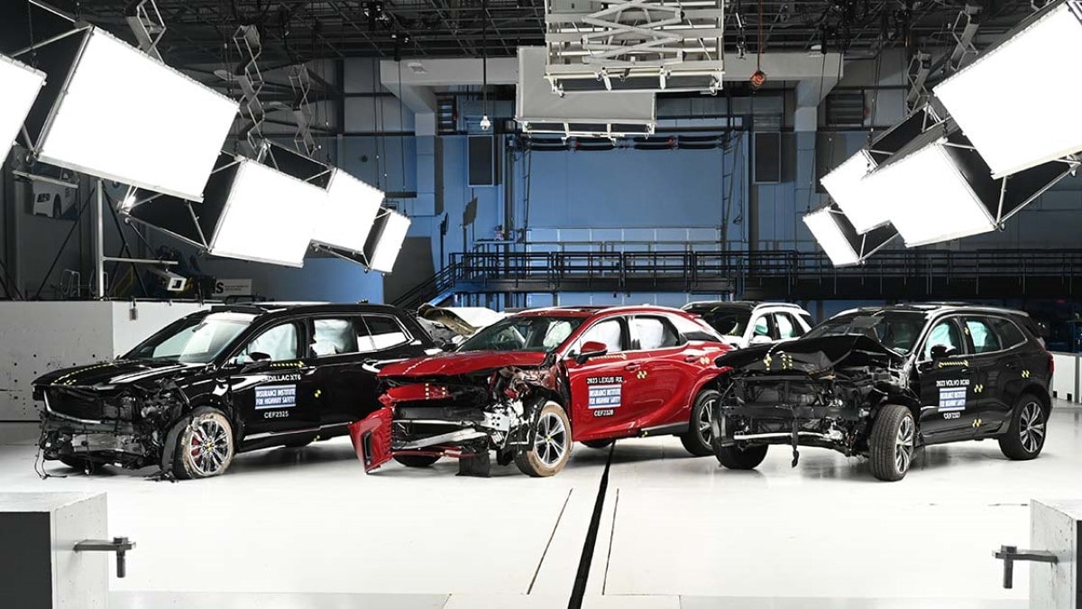 A group of 2023 luxury midsize SUVs after IIHS crash testing