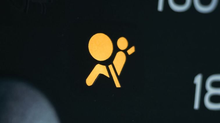 Airbag warning icon.