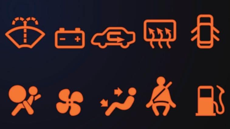 Illuminated car dashboard icons.