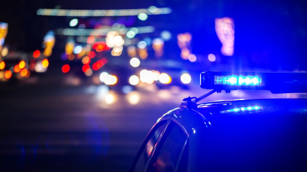 A police car seen at night