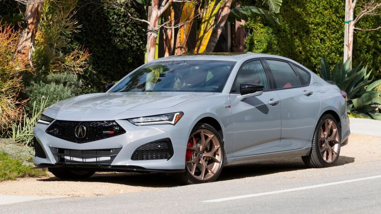 2024 Acura TLX Type S in Urban Grey Pearl near palm trees and succulents.