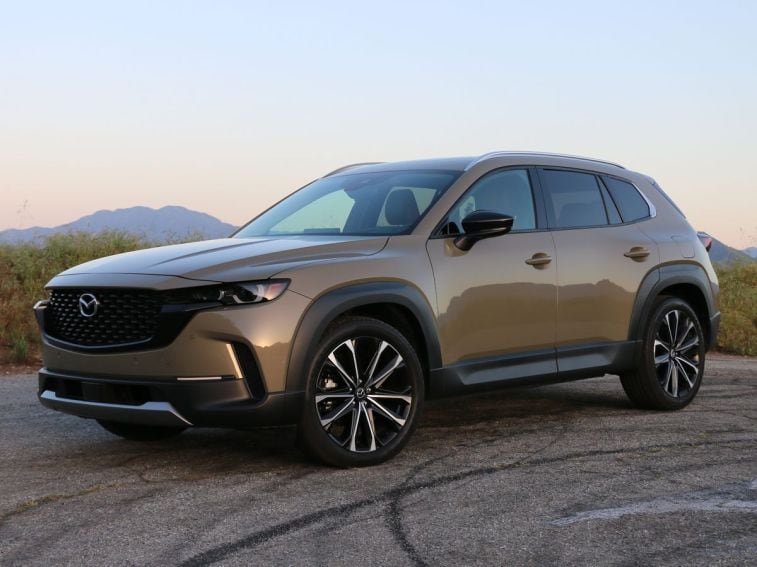 2024 Mazda CX-50 with grass in the background.