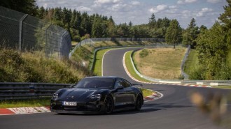 A teaser photo showing what is likely the 2025 Porsche Taycan Turbo GT