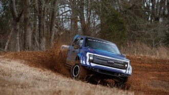 The Ford F-150 Lightning Switchgear concept throws up dirt while off-roading