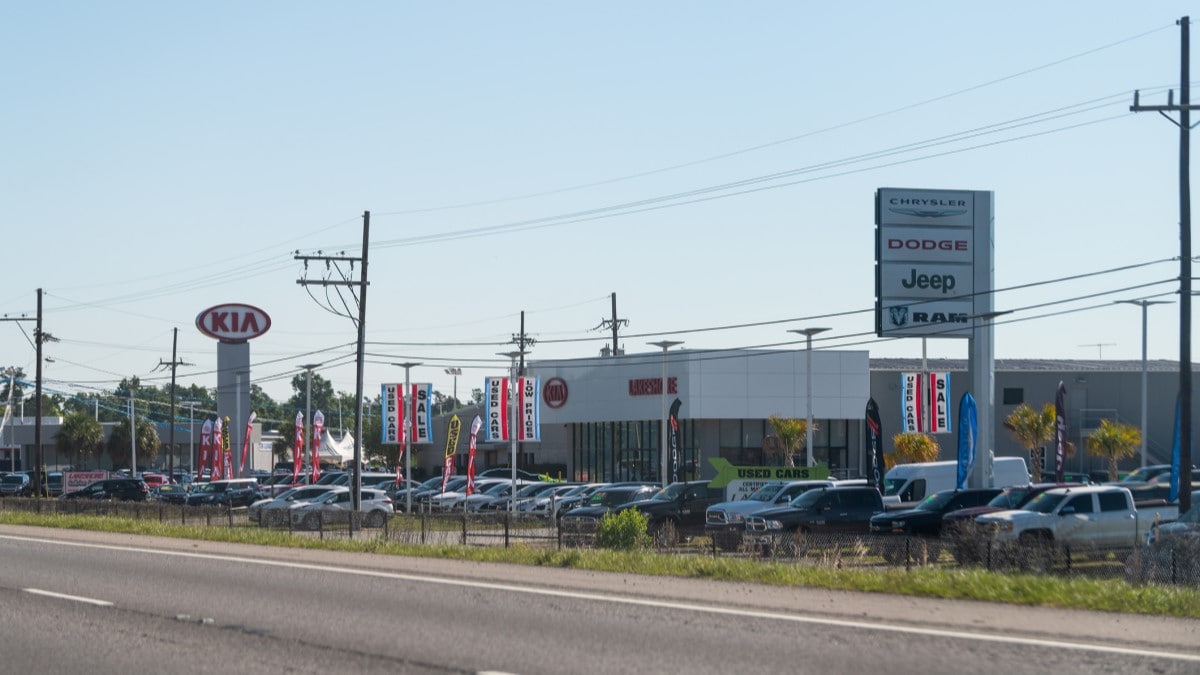 Several used car dealerships clustered together