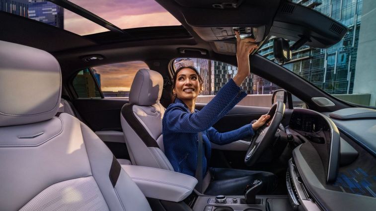 2024 Cadillac XT4 Sport featuring a LYRIQ-inspired 33-inch-diagonal interface and Fineline Calico high gloss genuine wood trim.