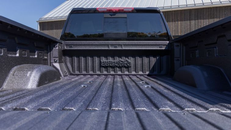2024 Chevrolet Silverado HD bed with High Country badge.