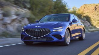 Front view of the 2024 Genesis G70 in blue.