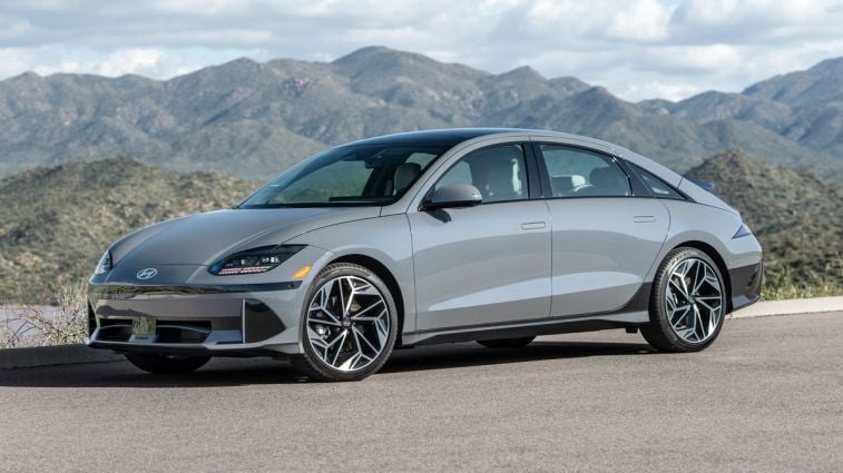 2024 Hyundai IONIQ6 Limited in grey with hills in the background.