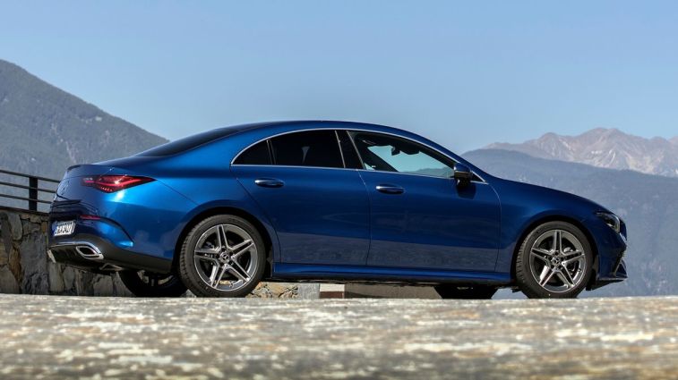 2024 Mercedes-Benz CLA 250 4MATIC in blue with mountains in the background.