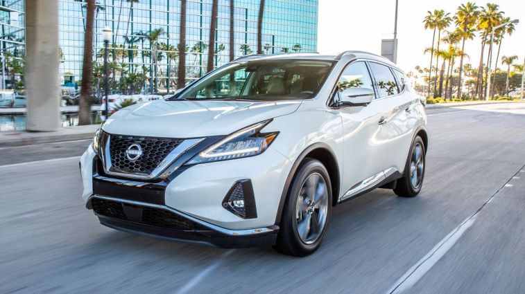 2024 Nissan Murano in white driving in Long Beach, CA.