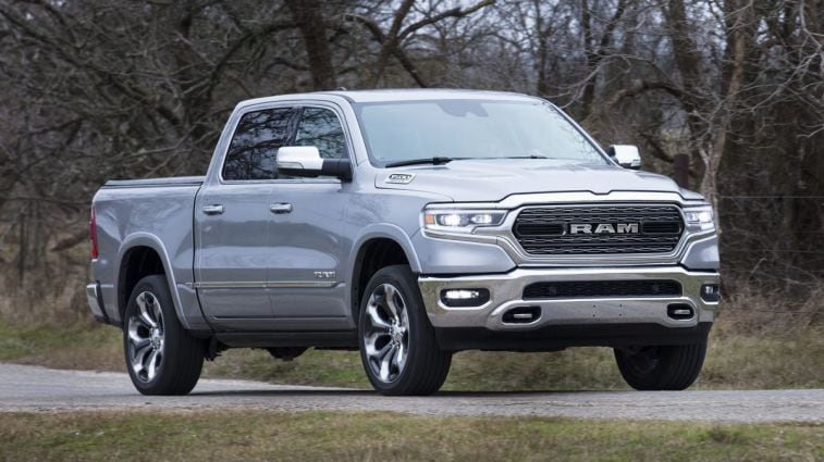 2024 Ram 1500 Limited with dormant trees in the background.