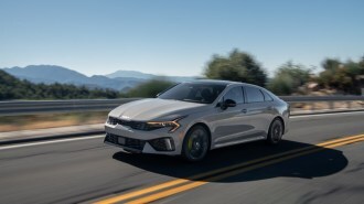 The 2025 Kia K5 seen from a front quarter angle