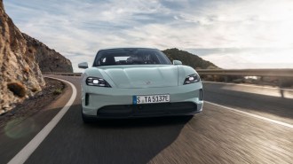 The 2025 Porsche Taycan seen from head-on