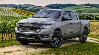 2025 Ram 1500 Ramcharger Limited parked in a vineyard.