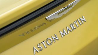 Aston Martin Vantage Roadster badge.