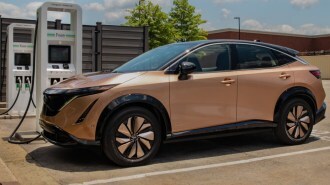 The 2024 Nissan Ariya plugged in to charge