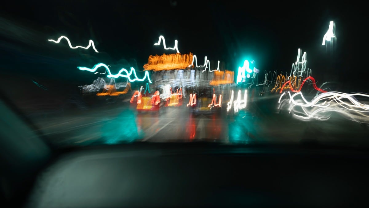 Blurred and shaky car lights and traffic.