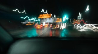 Blurred and shaky car lights and traffic.