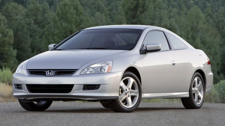 2006 Honda Accord Coupe EX-L with trees in the background.