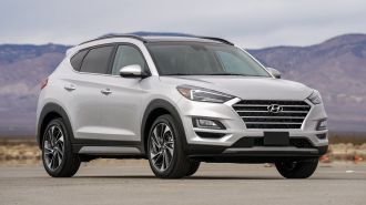 2021 Hyundai Tucson with hills in the background.