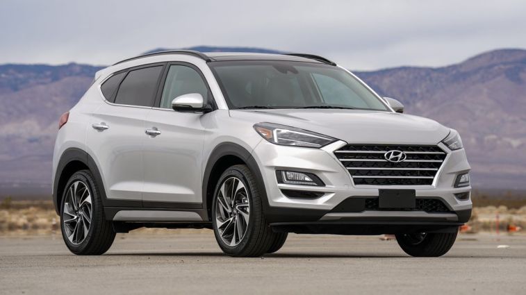 2021 Hyundai Tucson with hills in the background.