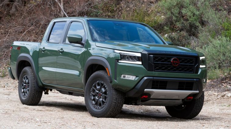 2024 Nissan Frontier PRO-4X parked on dirt.